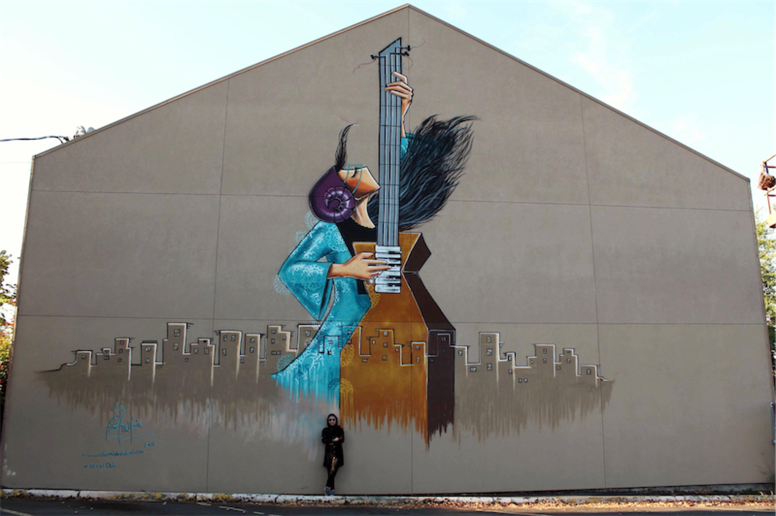 S. Hassani Chello player with by stander