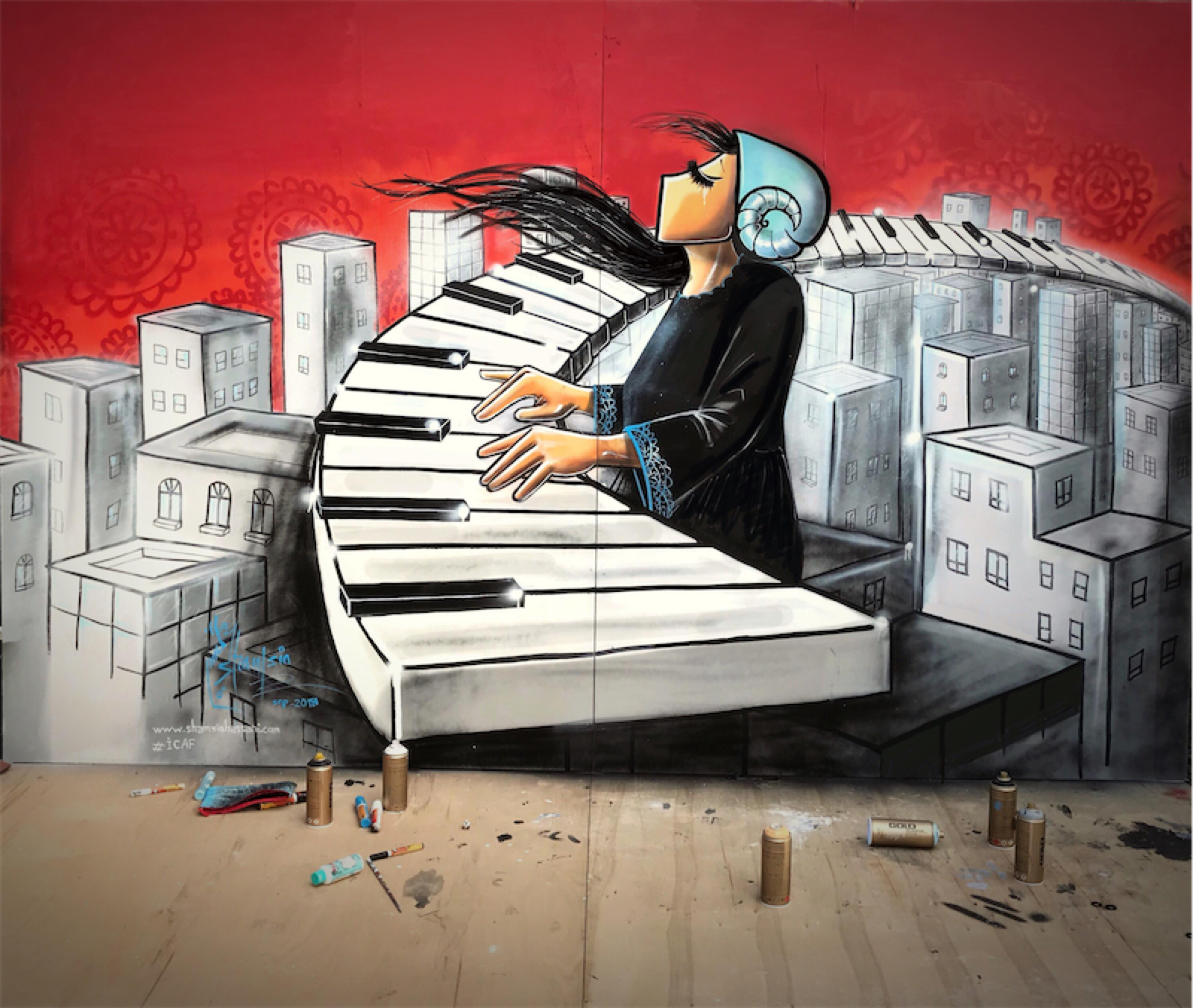 S. Hassani. Piano player above the city