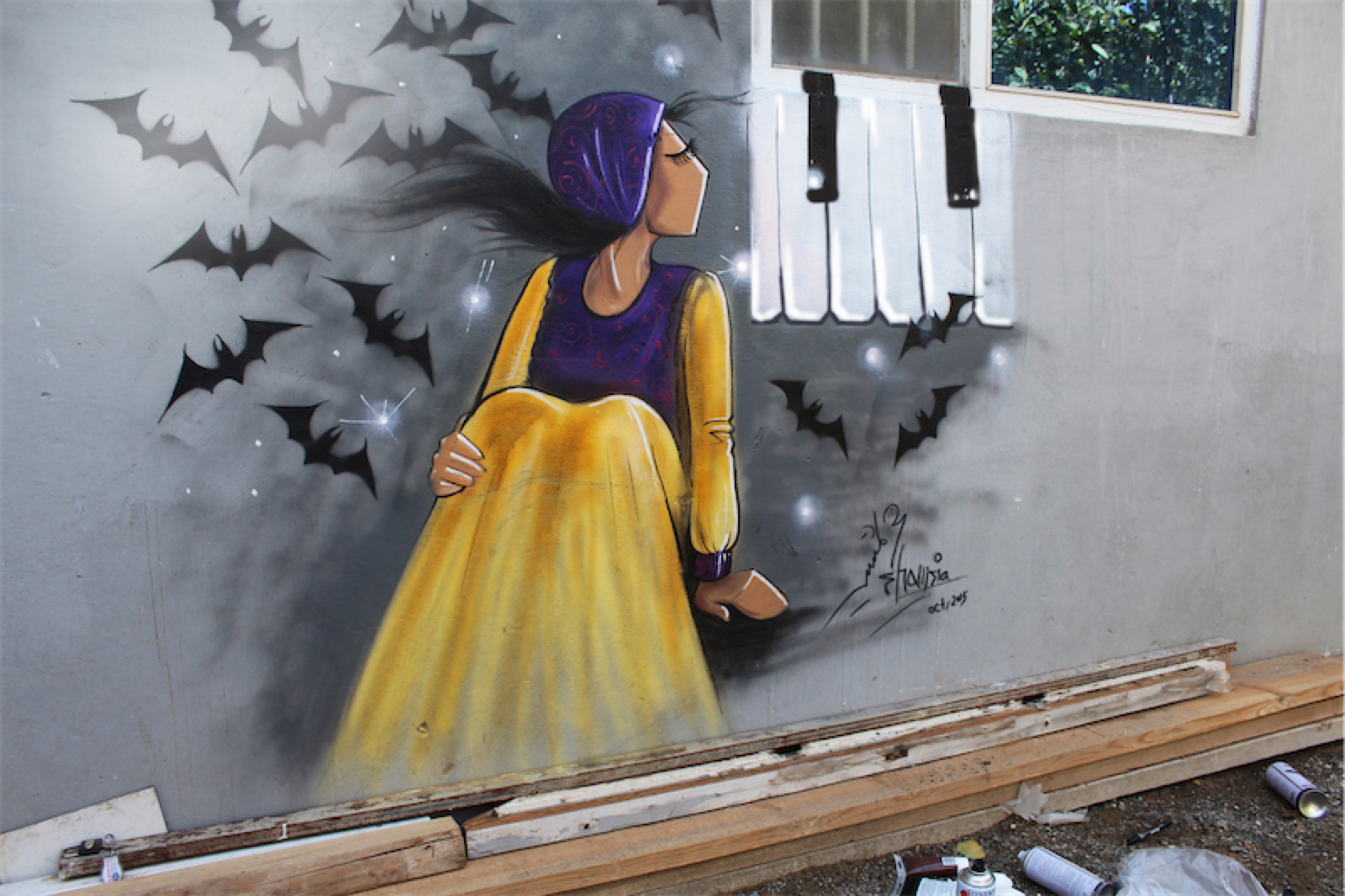 S. Hassani Woman with bats